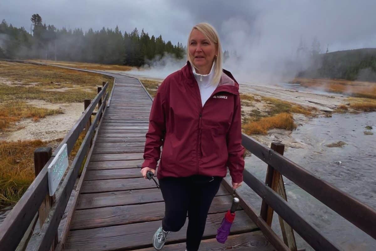 A woman makes a face due to the smell of sulfur in Yellowstone National Park, Wyoming