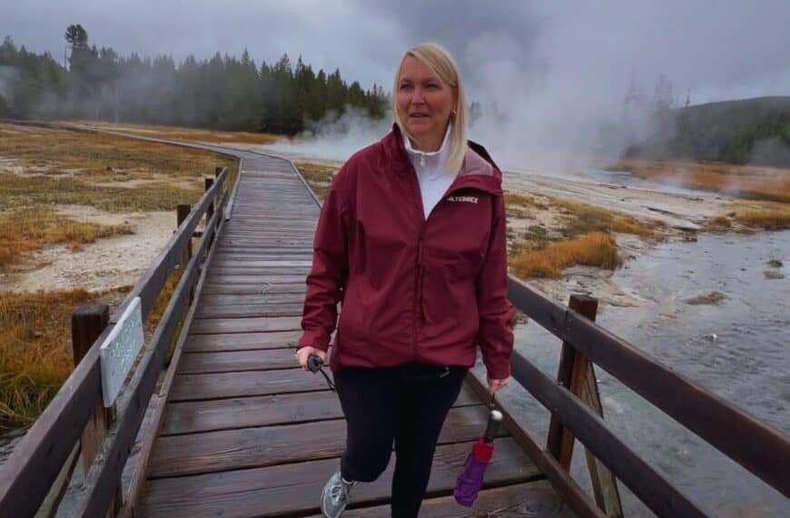 A woman makes a face due to the smell of sulfur in Yellowstone National Park, Wyoming
