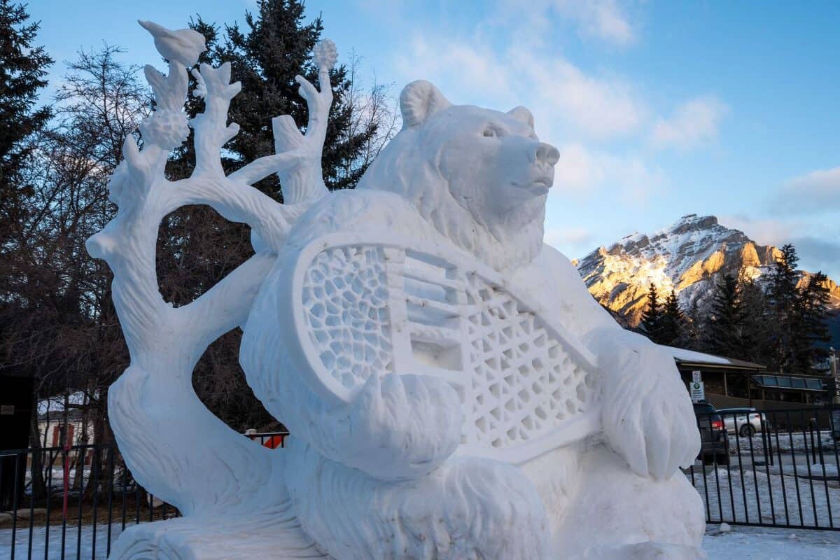 Closeup of a giant bear snow sculpture at the SnowDays Festival in Banff and Lake Louise, Alberta, Canada.