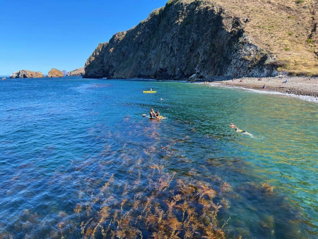 Channel Islands National Park visitors kayak and snorkel just off the coast of Santa Cruz Island.