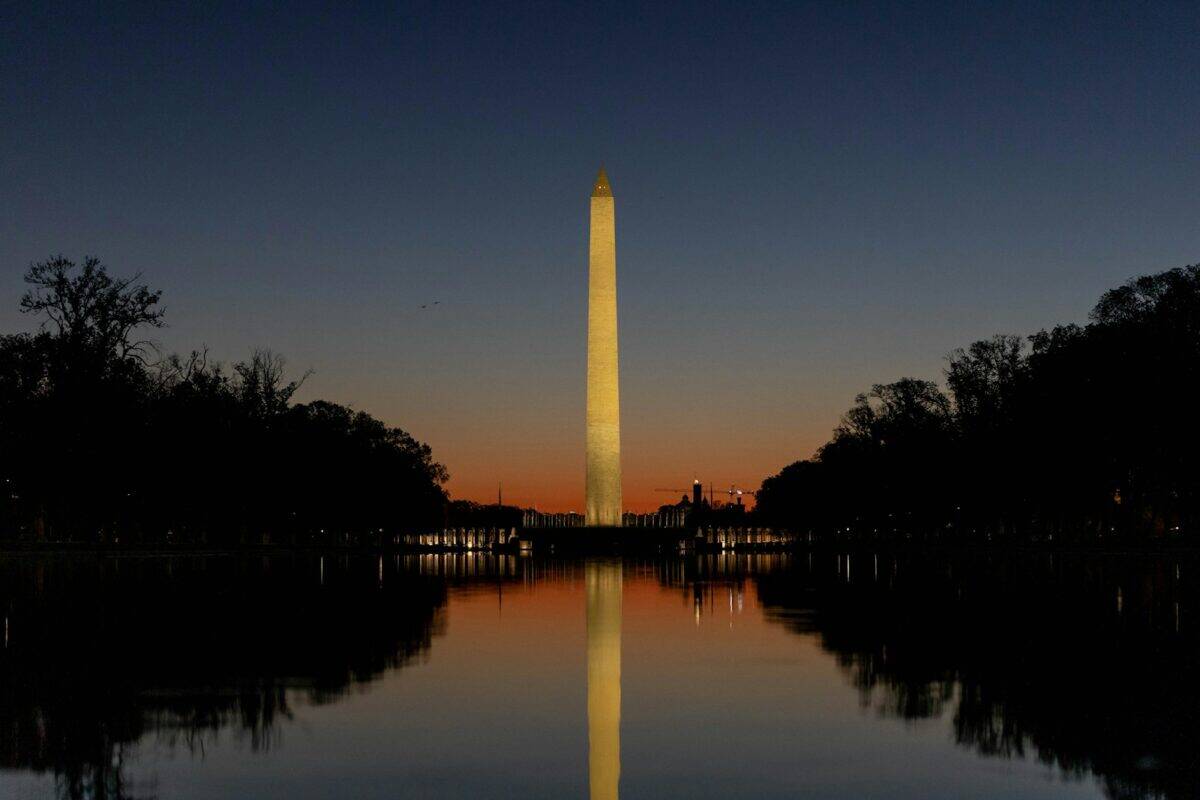 The Washington Monument is reflected in the water of the Lincoln Memorial Reflection Pool, Washington, DC.