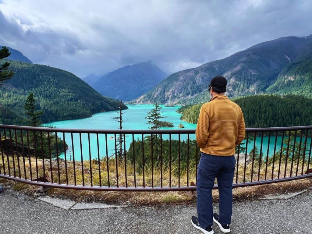 A man savors the view of Diablo Lake in North Cascades National Park, Washington.