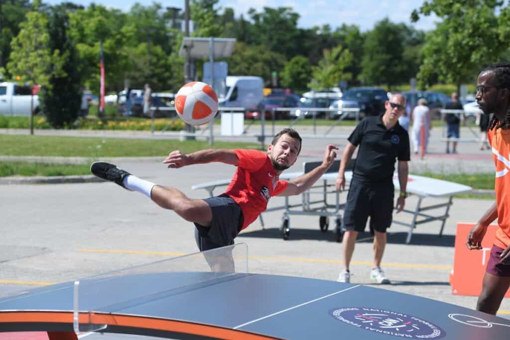 A man prepares to kick a ball during the GOOD Games.