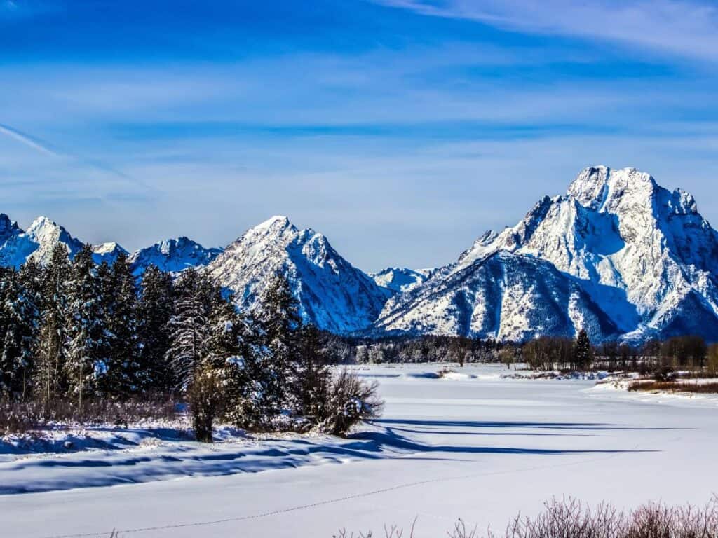 Snow covers the fields and mountains in Grand Teton National Park, WY