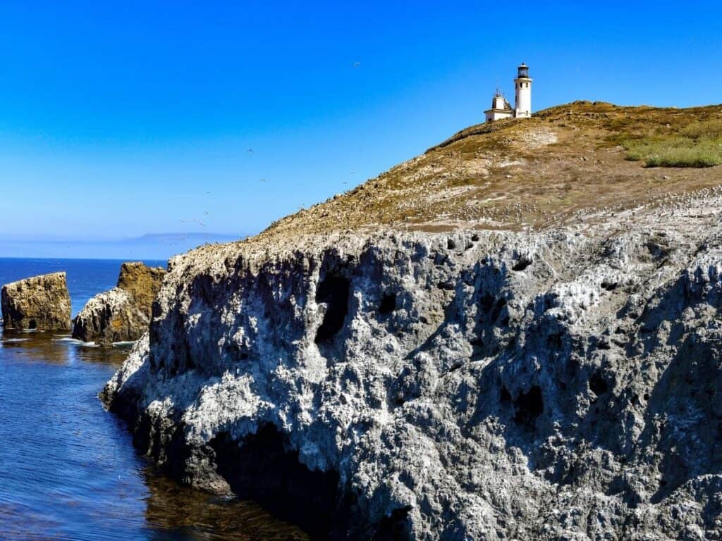Anacapa Island Lighthouse rises above the rocky Anacapa Island in Channel Islands National Park, California.