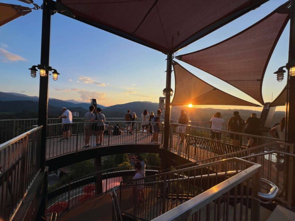 Anakeesta visitors gather on the AnaVista Tower deck to watch sunset.